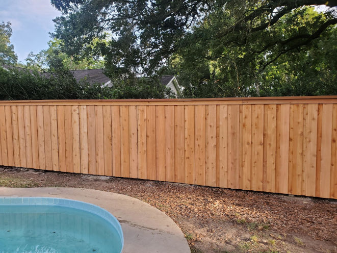 Wood Fence with Board-on-Board Cap Molding