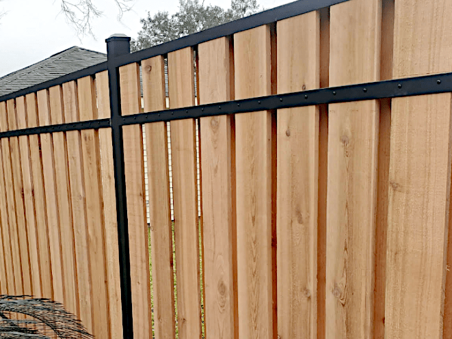 6’ High Slip Fence with Cedar Fence Boards and Aluminum Posts. Shadowbox Style with Approximately 90% Privacy.