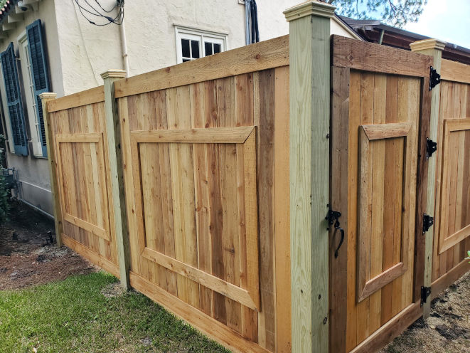 Custom six-foot-high cedar fence in Lakeview with picture frame windows.