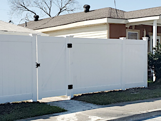 White Privacy Fence Specifically for High Wind-Loads for up to 130 MPH gusts and sustained winds of 75 MPH.