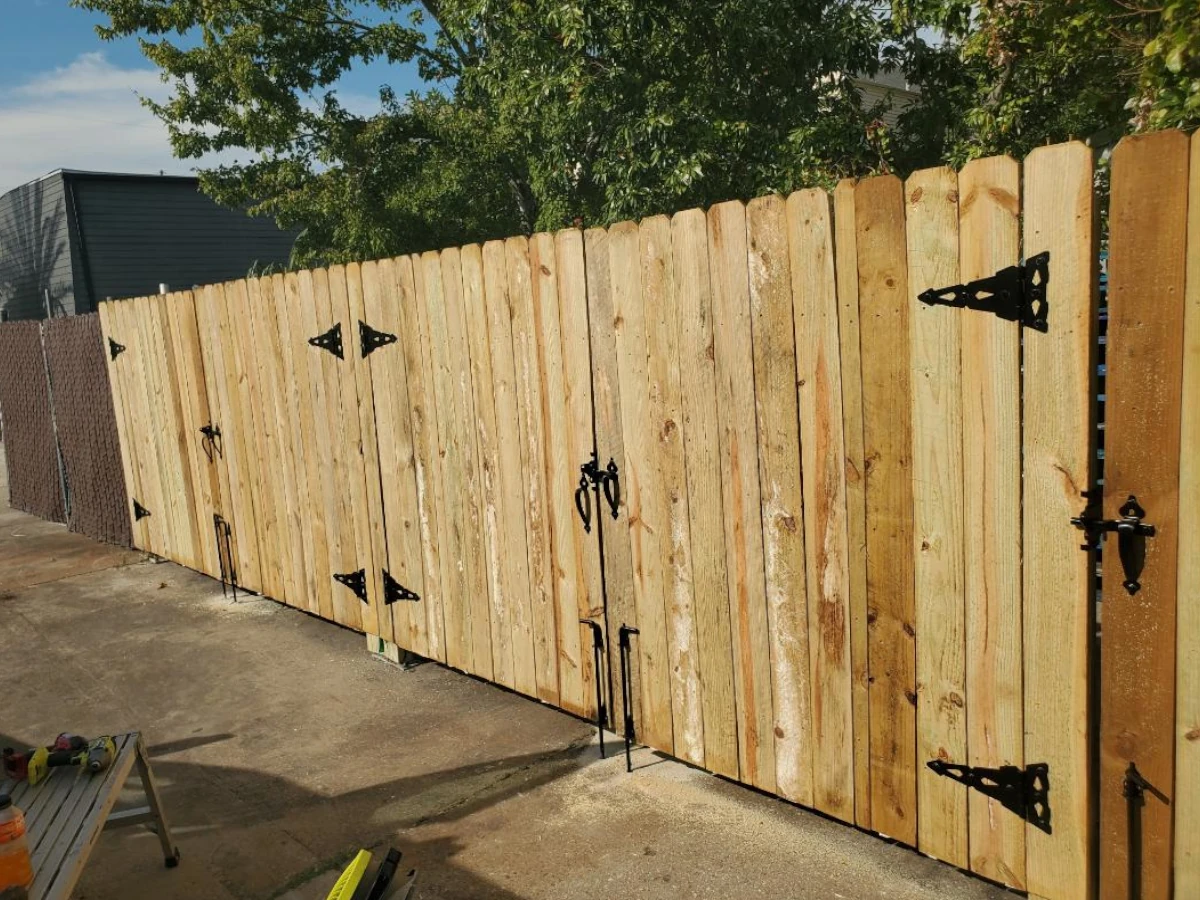 6' high pine double drive gates on metal plated posts